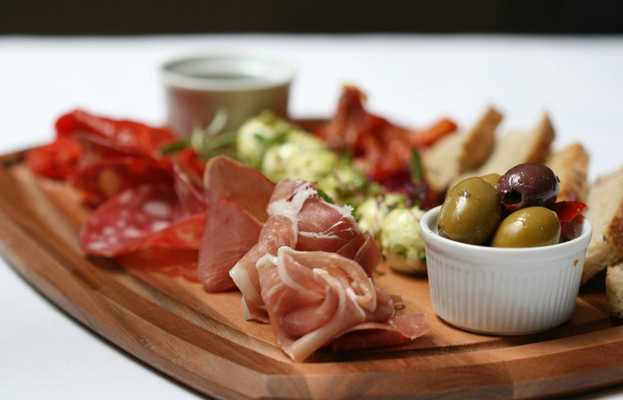 The Three Crowns Hotel Chagford Kültér fotó A selection of cured meats