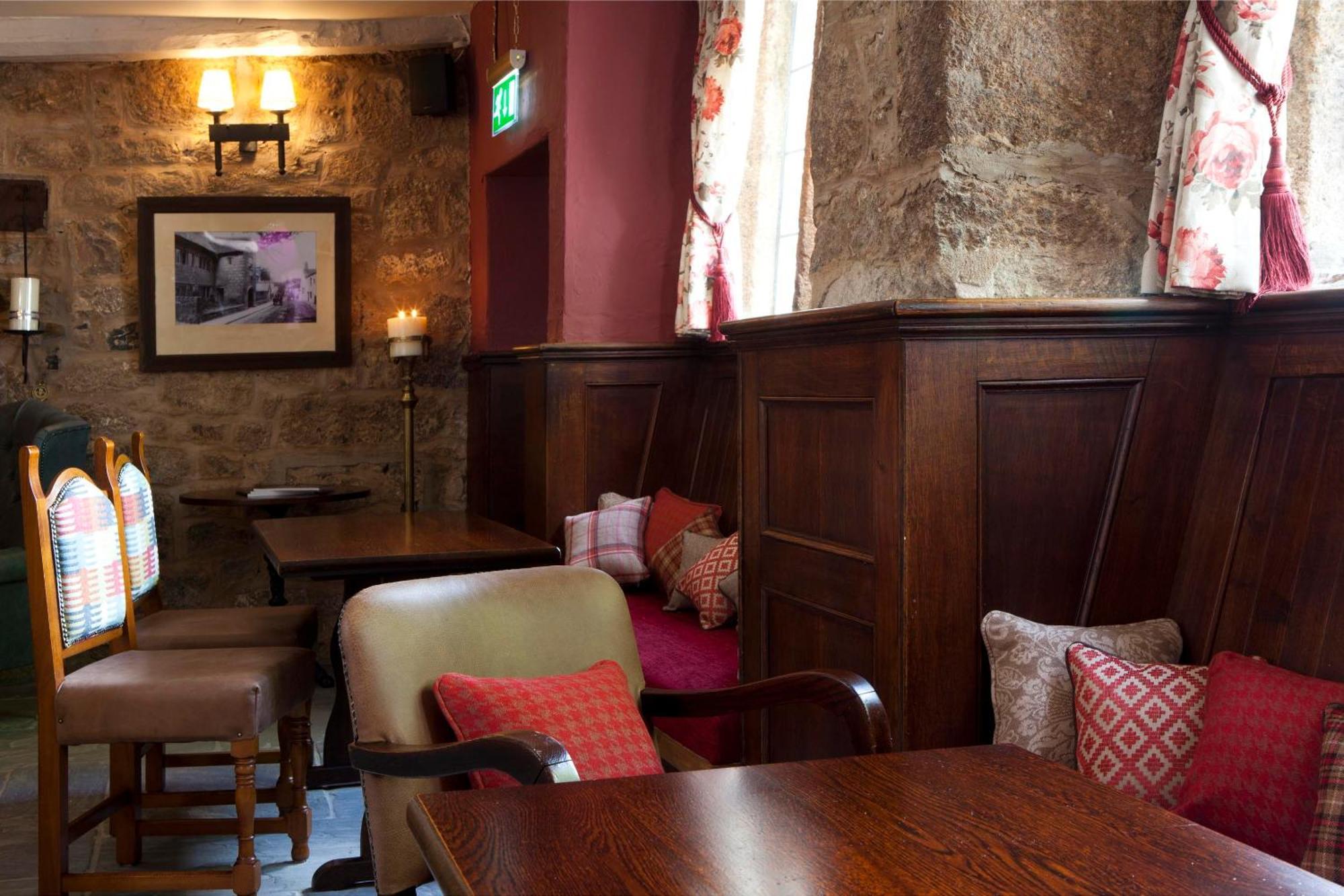 The Three Crowns Hotel Chagford Kültér fotó The interior of the pub