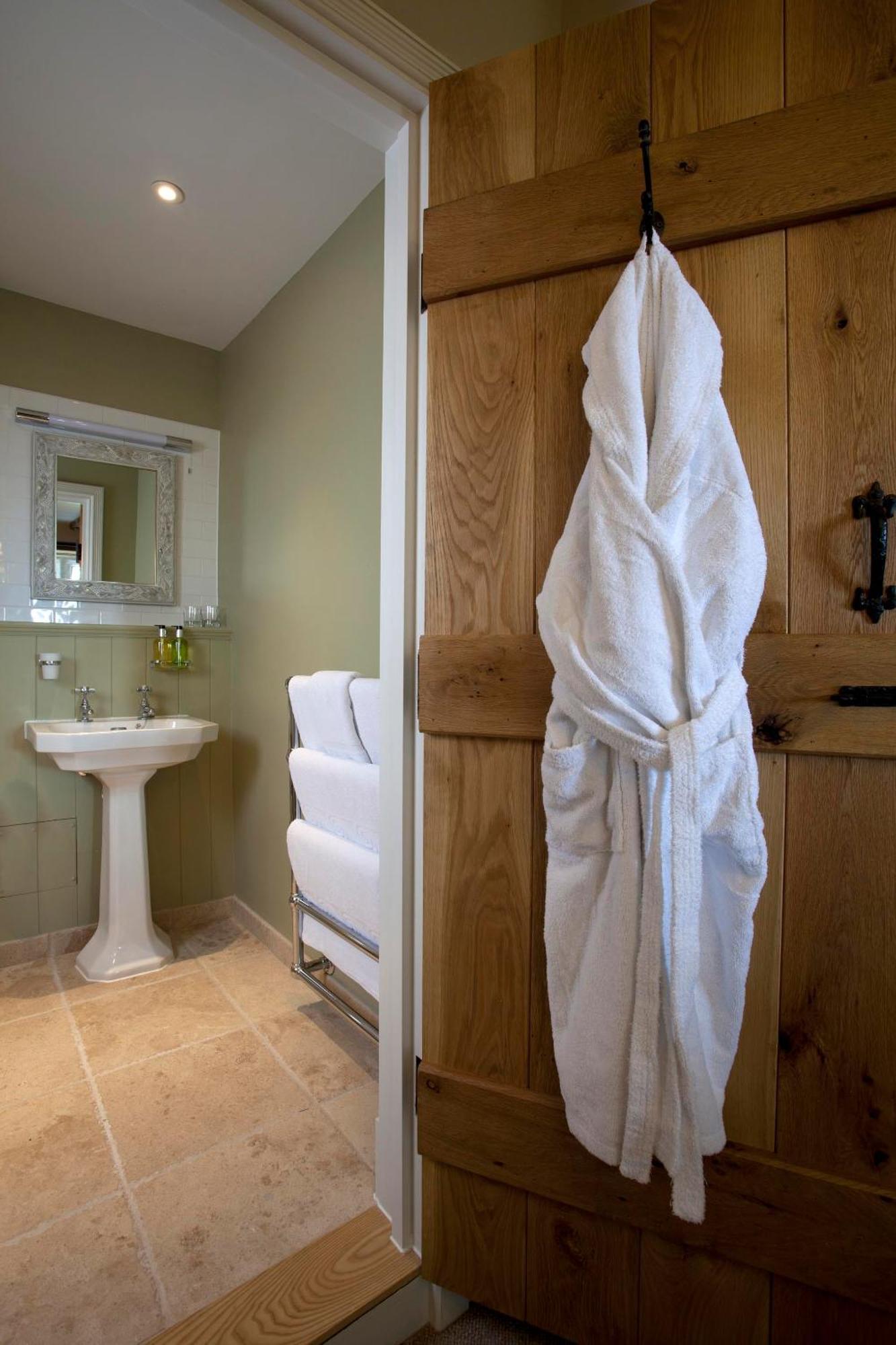 The Three Crowns Hotel Chagford Kültér fotó A bathrobe hanging on a door